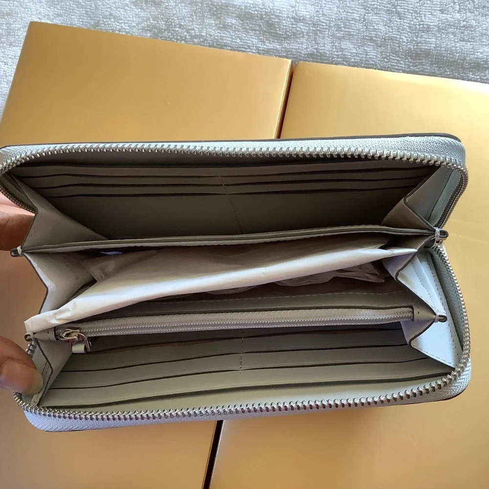 Kate Spade New York GLIMMER LARGE CONTINENTAL WALLET Silver